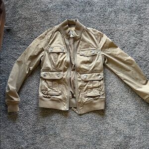 Super cute Triple 5 Soul Jacket. lined, green and ties in back.